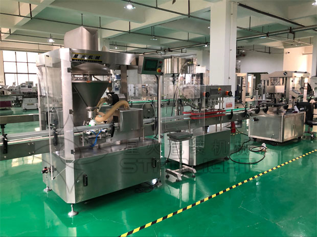 星火全自動雞粉灌裝機設備生產(chǎn)線展示